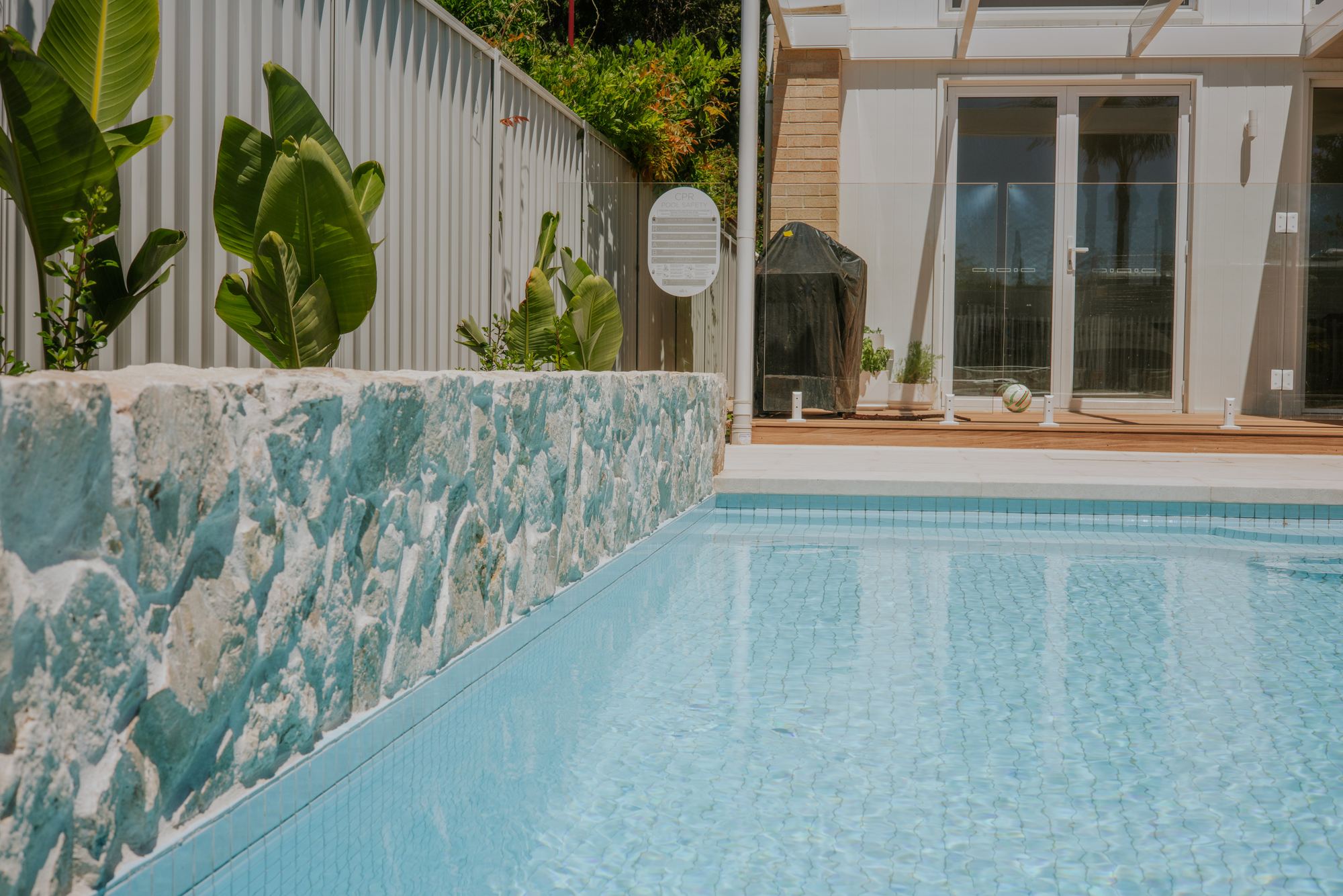 A landscaped pool and garden by Adelaide Landscape Concepts